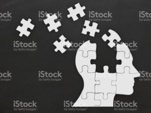 Puzzle head silhouette for brain memory content
