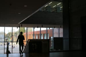 Person walking in a library